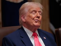 President Donald Trump attends a meeting of his Cabinet in the Cabinet Room of the White House on December 02, 2025 in Washington, DC.