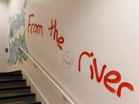 Graffiti is pictured on a wall as pro-Palestinian demonstrators have occupied the Millar Library on the campus of Portland State University.