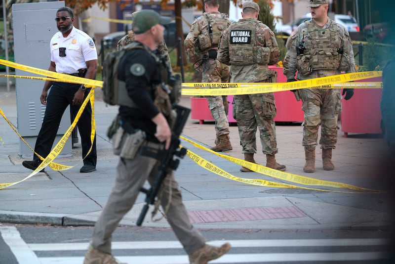 WASHINGTON, DC - NOVEMBER 26: Members of law enforcement and National Guard soldiers respond to a shooting near the White House on November 26, 2025 in Washington, DC. At least two National Guard soldiers have been shot blocks from the White House. (Photo by Chip Somodevilla/Getty Images)