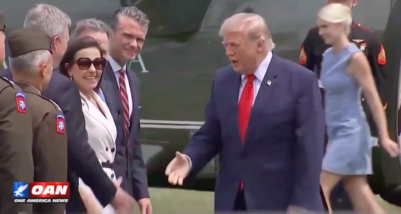 Trump shakes hands as Harp deboards after their arrival in Pennsylvania on Wednesday.