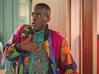 Ncuti Gatwa in ‘Sex Education’ with his hand on his chest in shock