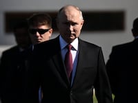 Russian President Vladimir Putin walking.