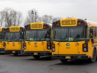 Garden City, N.Y.: School buses line up at Garden City Middle School.