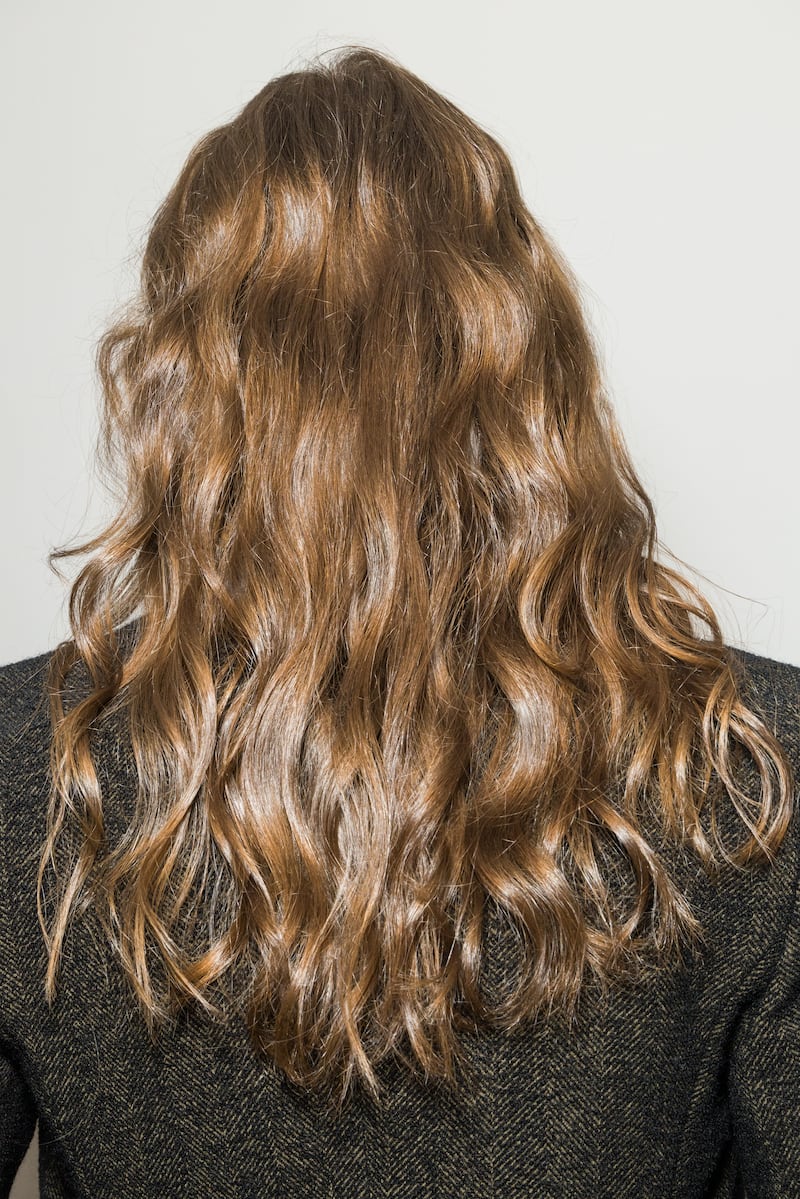 MILAN, ITALY - FEBRUARY 26: A model poses, hair detail, backstage at the Max Mara fashion show during the Milan Fashion Week - Womenswear Fall/Winter 2025/2026 on February 26, 2025 in Milan, Italy. (Photo by Rosdiana Ciaravolo/Getty Images)