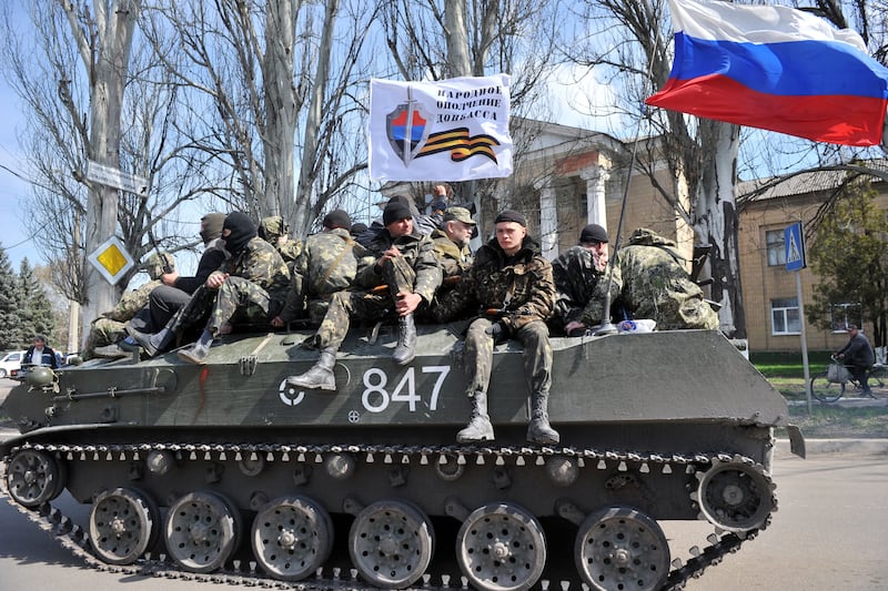 articles/2014/04/17/ukrainian-troops-surrender-to-unarmed-pro-russian-protesters/140316-nemstova-ukraine-tease_z038ki