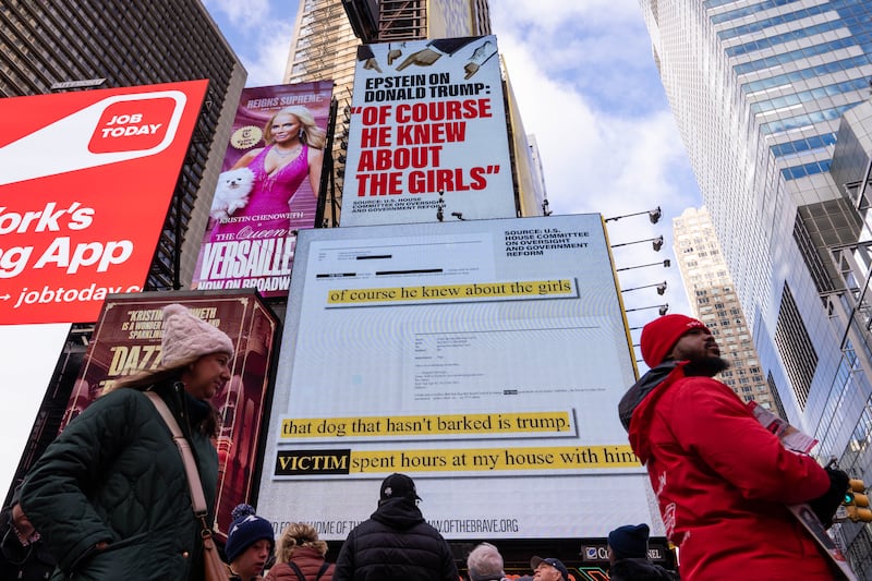 A billboard in Times Square, paid for by the group Home of the Brave, highlights Jeffrey Epstein's comment that Donald Trump "of course he knew about the girls.", on November 17, 2025 in New York City.