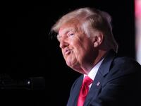 2021-09-26T023406Z_160538055_RC21XP9PLM9F_RTRMADP_3_USA-TRUMP_2_ojjek9