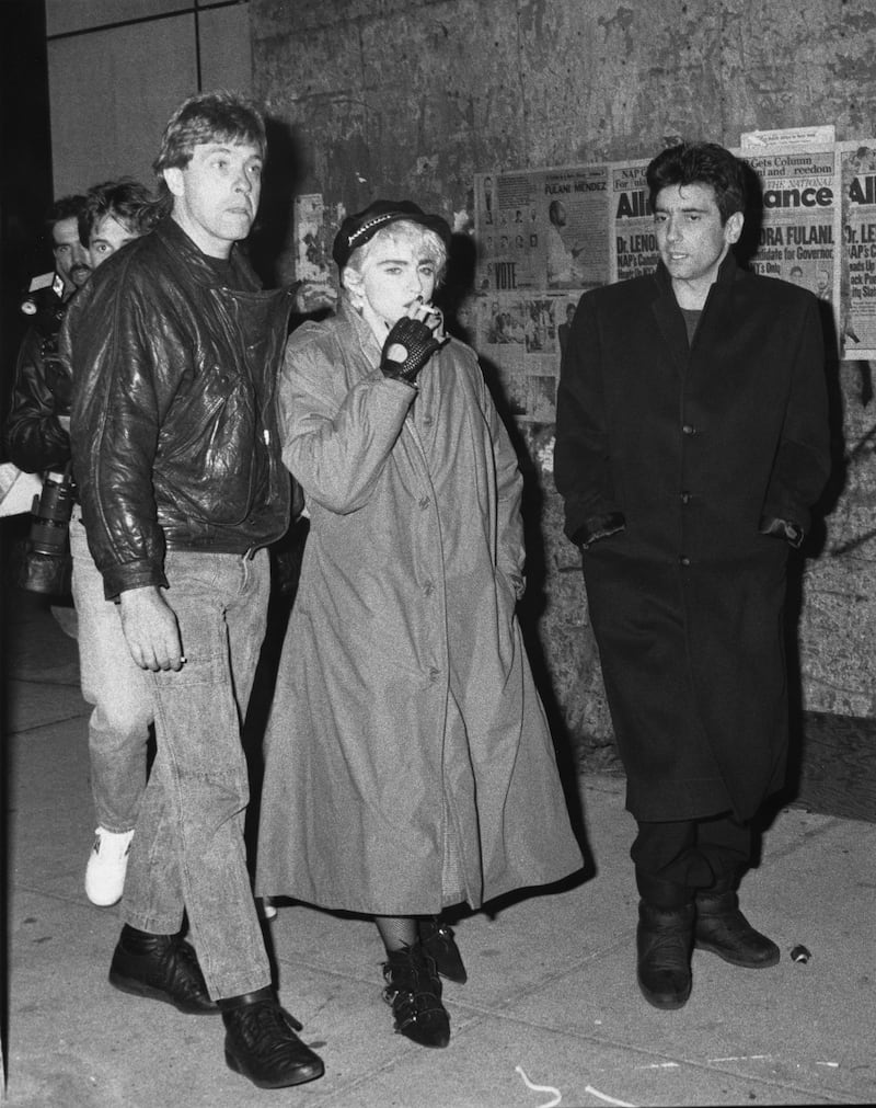 American singer and actress Madonna is photographed with co-star Griffin Dunne during the filming of ‘Slammer,’ later titled 'Who’s That Girl?’ in 1987.