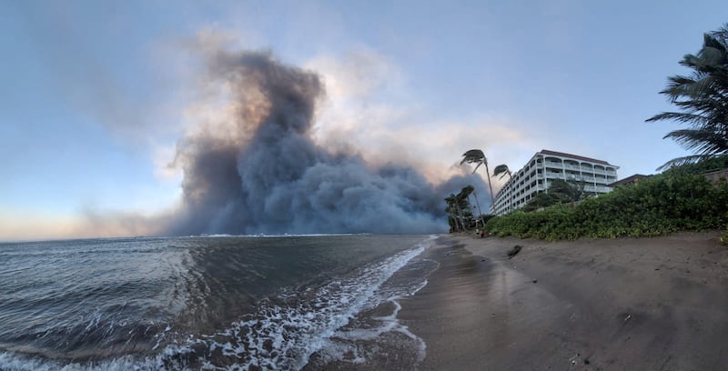 An aerial view shows wildfire smoke in Lahaina.