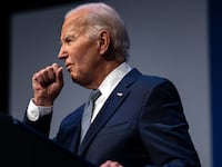 Joe Biden clearing his throat as he speaks on economics during the Vote To Live Properity Summit at the College of Southern Nevada in Las Vegas, Nevada.