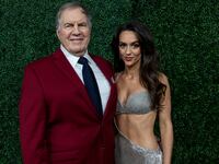 Bill Belichick and Jordon Hudson pose for a photo on the red carpet at the 14th Annual NFL Honors at Saenger Theatre on Feb. 6.