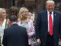 NEW YORK, NEW YORK - SEPTEMBER 07: (L-R) White House press secretary Karoline Leavitt, U.S. Attorney General Pam Bondi and U.S. President Donald Trump share a laugh before the start of the U.S. Open men's singles final at the Billie Jean King National Tennis Center for the U.S. Open finals on September 7, 2025 in New York City. President Trump is attending the U.S. Open men’s singles final between Carlos Alcaraz and Jannik Sinner. (Photo by Kevin Dietsch/Getty Images)