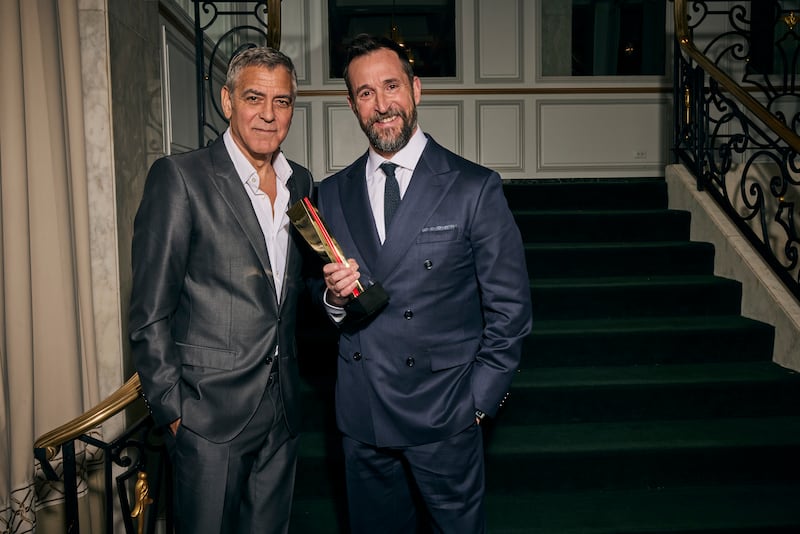 BEVERLY HILLS, CALIFORNIA - JANUARY 10: (L-R) George Clooney and Noah Wyle pose for a portrait during the 2026 Annual Movies for Grownups Awards with AARP at Beverly Wilshire, A Four Seasons Hotel on January 10, 2026 in Beverly Hills, California. (Photo by Maarten De Boer/Getty Images for AARP)