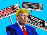 Donald Trump appears in this photo illustration surrounded by anti-Trump billboards.