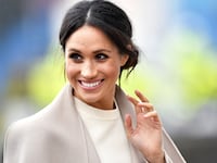 A photo including Meghan Markle