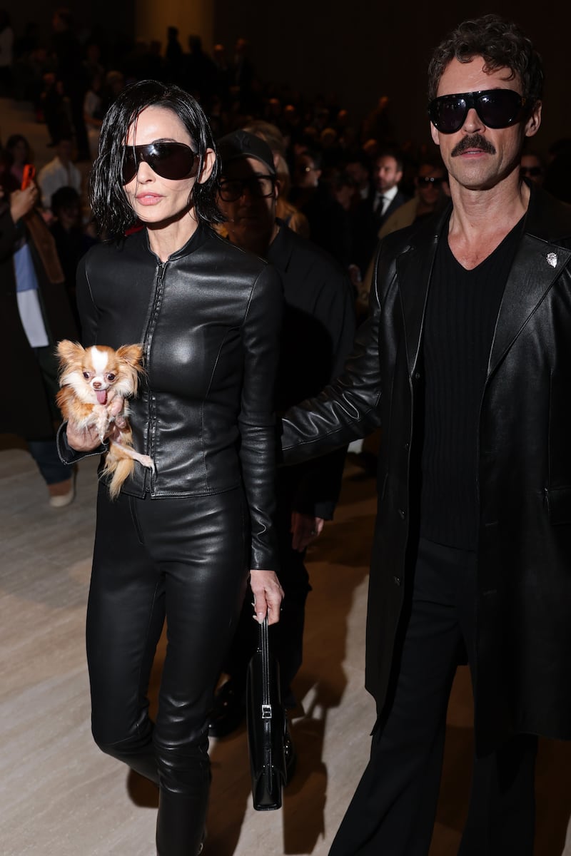 Moore's look drew comparisons to Trinity from "The Matrix." Here with celebrity stylist Brad Goreski.