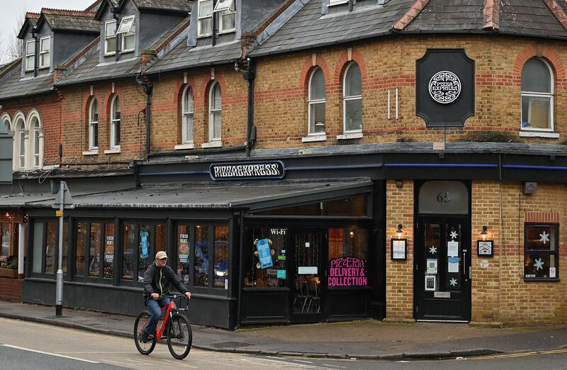 A general view of a Pizza Express restaurant in Woking in Surrey, southwest of London, is pictured on January 2, 2022. (Photo by Justin TALLIS / AFP) (Photo by JUSTIN TALLIS/AFP via Getty Images)