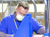 Arizona state Sen. Anthony Kern recounts ballots from the 2020 general election as a contractor working for Cyber Ninjas.