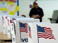 Man at voting booth