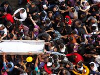 articles/2012/11/27/deaths-of-gaber-salah-islam-masoud-signal-egypt-s-dangerous-divisions/beach-egypt-united-by-death-tease_pky5gb