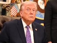 US President Donald Trump looks on during a signing ceremony on AI the Oval Office of the White House in Washington, DC, on December 11, 2025. (Photo by Alex WROBLEWSKI / AFP via Getty Images)