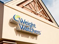 Sign at Weight Watchers business in a strip mall.