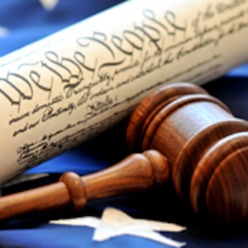 articles/2009/02/17/an-argument-against-legal-extremism/howard-legal-extremism-lawsuits_14409_nzqpfs