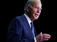 U.S. President Joe Biden delivers remarks at the House Democratic Caucus Issues Conference in Leesburg, Virginia, U.S., February 8, 2024.