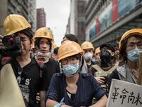 articles/2014/10/23/chinese-tourists-are-taking-hong-kong-protest-selfies/141022-hong-hong-kong-protest_sjsmye