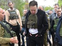 Elon Musk (C) and Israeli delegation, including Benjamin Netanyahu (R), visit the Kfar Aza settlements in southern Israel, one of the locations targeted by Hamas on Oct. 7, in Kfar Aza, Israel, on Nov. 27, 2023.