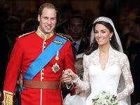 Prince William and Princess Catherine smile following their marriage at Westminster Abbey on April 29, 2011, in London, England.