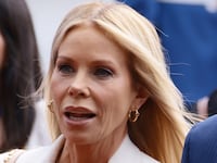 U.S. Health and Human Services Secretary Robert F. Kennedy Jr. (R) and his wife Cheryl Hines
