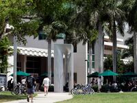 Students walk on the campus of the University of Miami.