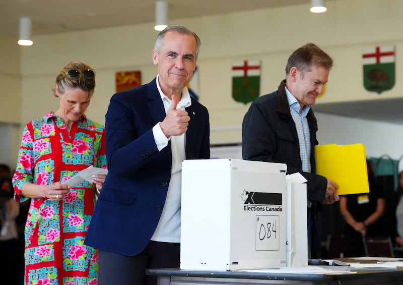 Canadian Prime Minister and Liberal Party Leader Mark Carney gives a thumbs up after casting his ballot a polling station during the federal election in Ottawa, Canada on April 28, 2025.