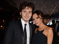 Brooklyn Beckham and Victoria Beckham attend The Fashion Awards 2018 in partnership with Swarovski at the Royal Albert Hall on December 10, 2018 in London, England.