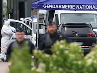 A manhunt has been launched in France to find Mohamed Amra, a prisoner known as ‘The Fly,’ and the gunmen who helped him escape from custody in a deadly police van ambush.