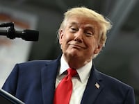 US President Donald Trump smiles as he finishes his speach during a campaign rally at Curtis D. Menard Memorial Sports Center in Wasilla, Alaska, on October 13, 2026. (Photo by Kent NISHIMURA / AFP via Getty Images)