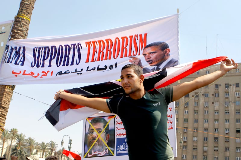 articles/2013/07/02/obama-offers-a-revisionist-history-of-his-administration-s-approach-to-egypt/130702-egypt-anti-morsi-obama-alt-tease_enkhxd