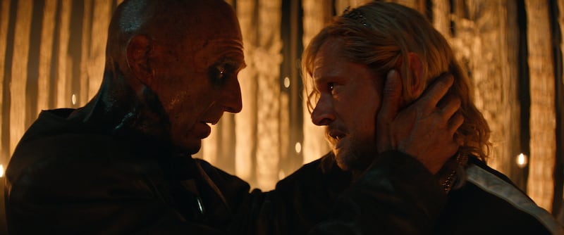 Ralph Fiennes as Dr. Kelson and Jack O'Connell as Sir Jimmy Crystal
