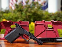 2022-04-11T200150Z_417625262_RC25LT9JBSFT_RTRMADP_3_USA-BIDEN-GUNCONTROL_bgfidw