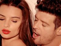 articles/2013/07/25/blurred-lines-goes-viral-rating-15-mash-ups-parodies-covers-video/130617-robin-thicke-video-romano-tease_jxkwzn
