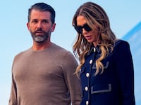 Donald Trump Jr., son of U.S. President Donald Trump and his girlfriend Bettina Anderson arrive with U.S. President Donald Trump at Andrews Air Force Base, Maryland on July 29, 2025 before boarding Marine One for a short trip to the White House.