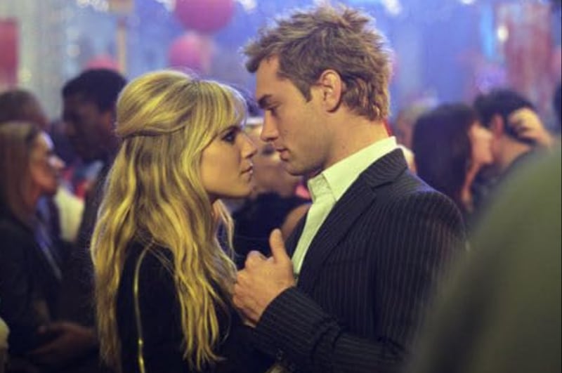 Sienna Miller and Jude Law in "Alfie" in 2004.