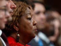 Ruby Freeman stares forward while listening to a congressional hearing.