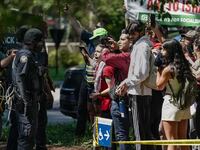 Protesters confront police at Emory University in Atlanta.
