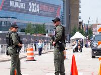 Miami police take security measures as Republican Party supporters arrive to the Fiserv Forum where the Republican National Convention (RNC) takes place in Milwaukee, Wisconsin