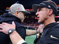 Head coach Arthur Smith (L) of the Atlanta Falcons greets head coach Dennis Allen (R) of the New Orleans Saints