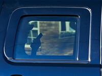 US President-elect Donald Trump talks on phone as he rides back from Trump International Golf Club to Mar-a-Lago, his residence in West Palm Beach, Florida, on November 27, 2024.