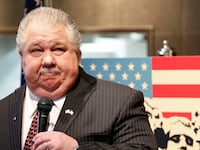 articles/2014/05/14/big-endorsements-turn-iowa-s-senate-race-upside-down/140514-sam-clovis-jacobs-tease_jcg9uz