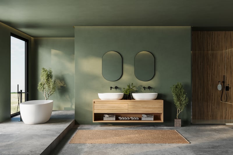 Contemporary bathroom with green walls, a floating wooden vanity